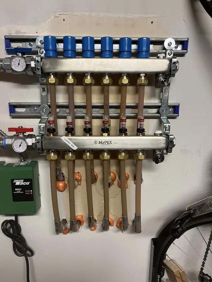 Plumber performing Water Heater Repair at a residential property in Shamong